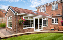 Modest Corner house extension leads